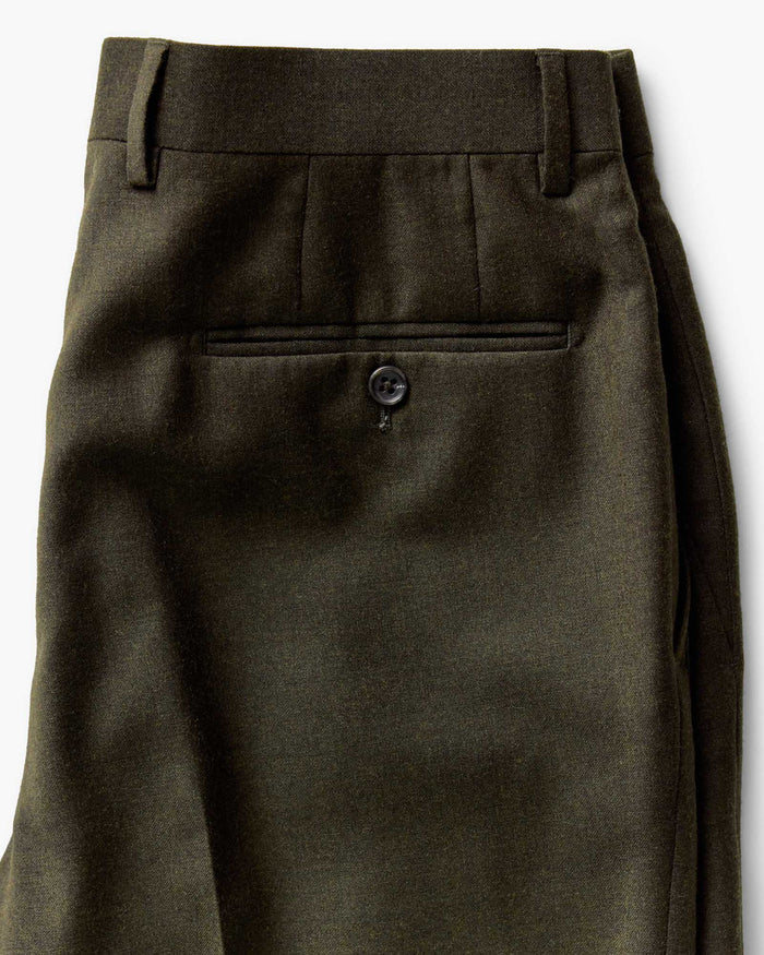 material shot of the back pocket on The Stevens Trouser in Black Olive Wool Flannel