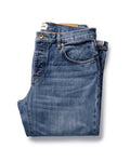 folded flatlay of The Straight Jean in Mid Wash Organic Selvedge