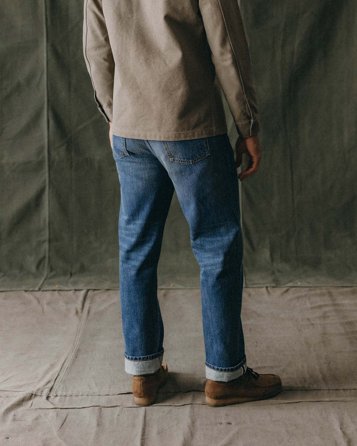 fit model showing off the back of The Straight Jean in Mid Wash Organic Selvedge