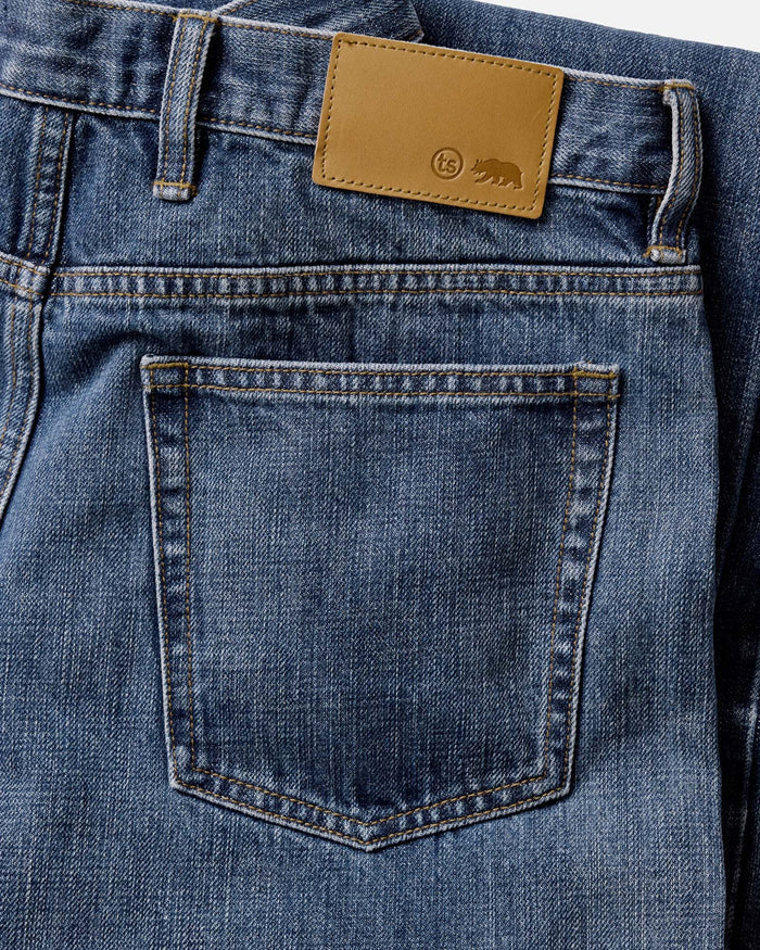 material shot of the back pocket on The Straight Jean in Mid Wash Organic Selvedge