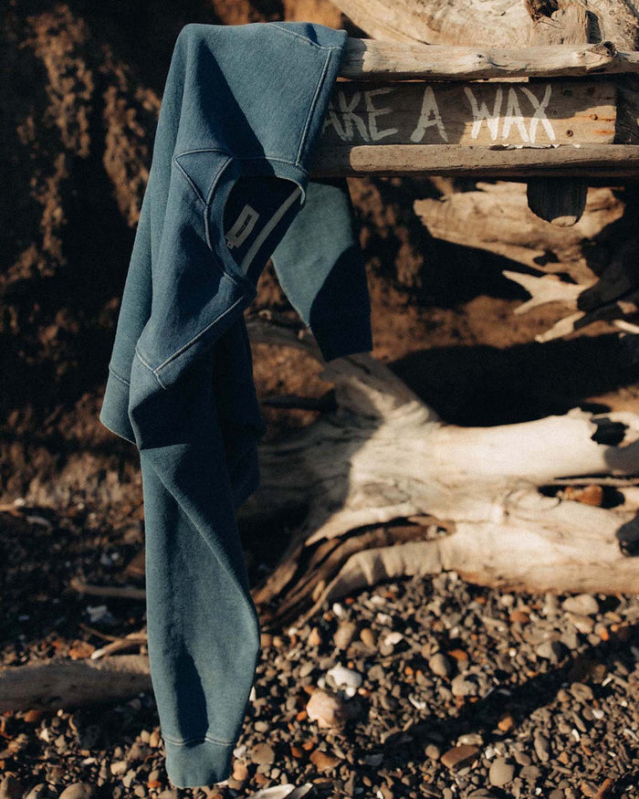 editorial image of The Apres Crew in Washed Indigo Terry hanging