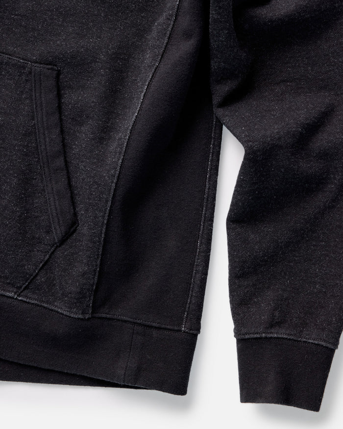 material shot of the sleeves on The Apres Hoodie in Black Indigo Terry