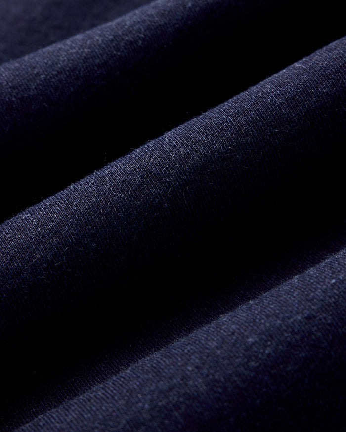 material shot of the hem on The Apres Hoodie in Indigo Terry