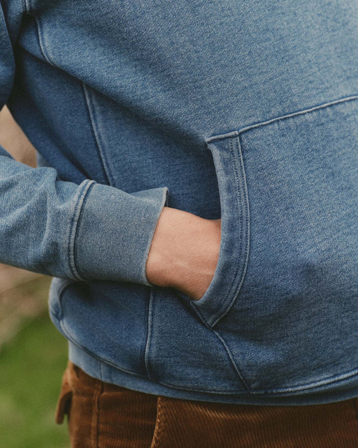 fit model showing off the hoodie on The Apres Hoodie in Washed Indigo Terry