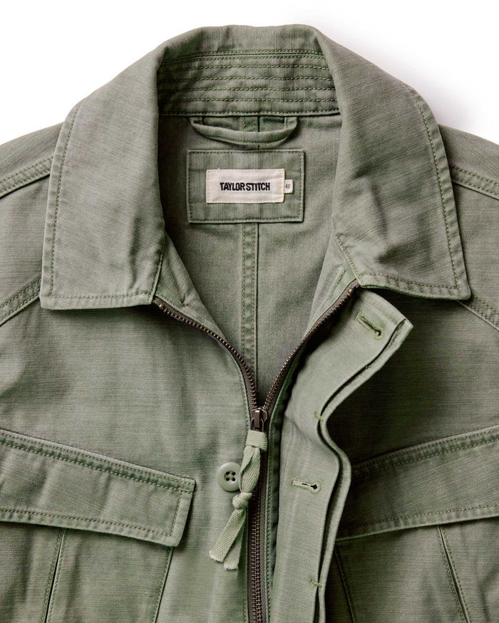 material shot of the collar and zipper front on The Surplus Jacket in Field Olive Reverse Sateen