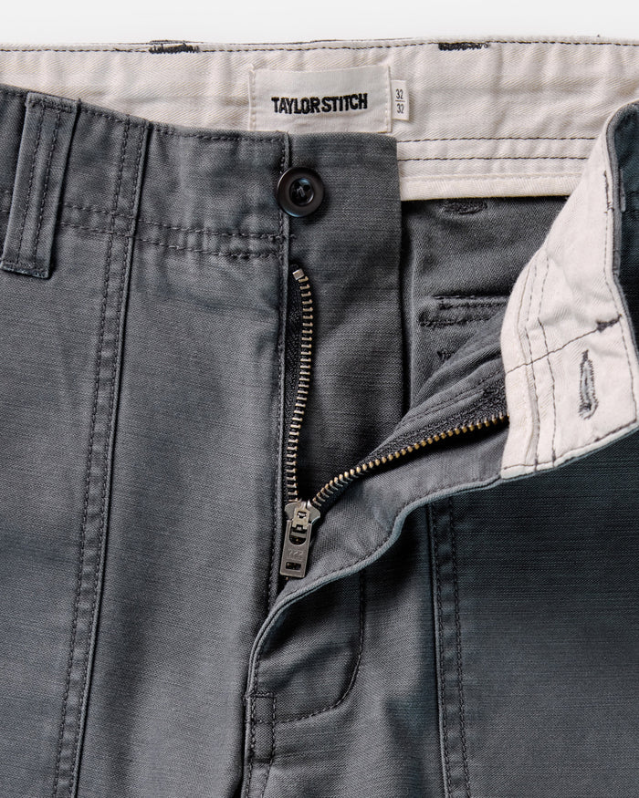 material shot of the zipper on The Surplus Pant in Faded Black Reverse Sateen