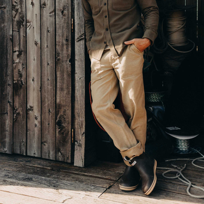 fit model with his hand in the pocket of The Surplus Pant in Khaki Reverse Sateen