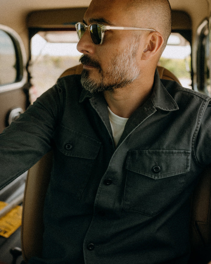 fit model posing in The Surplus Shirt in Faded Black Reverse Sateen