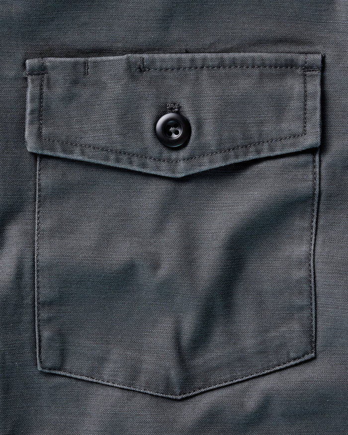 material shot of the pocket on The Surplus Shirt in Faded Black Reverse Sateen