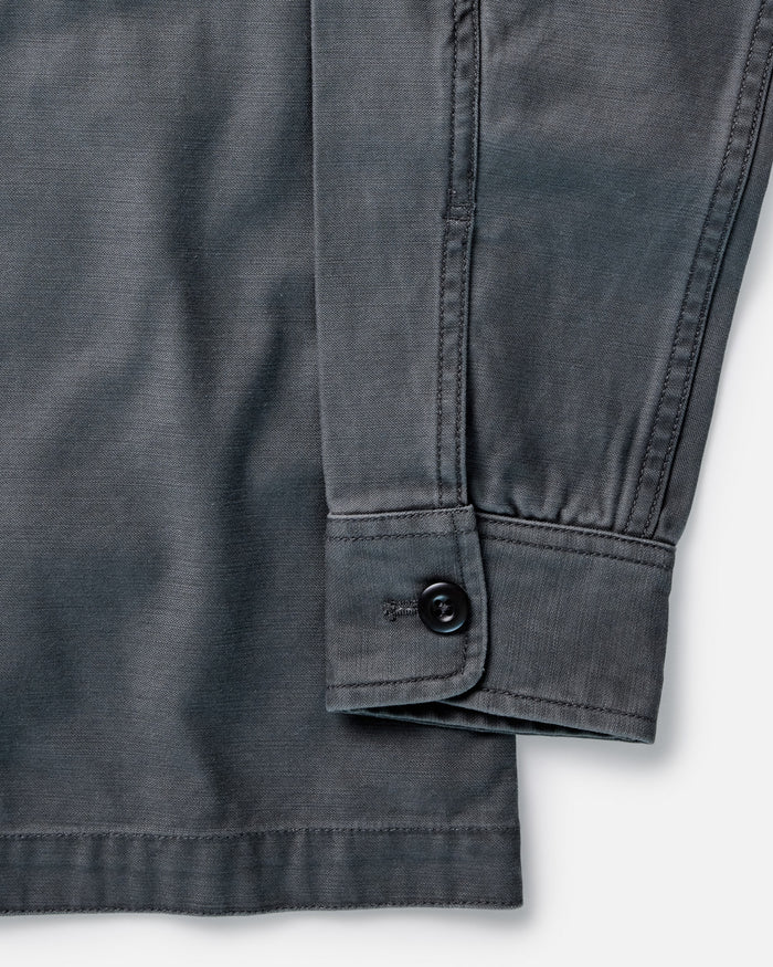 material shot of the sleeve on The Surplus Shirt in Faded Black Reverse Sateen