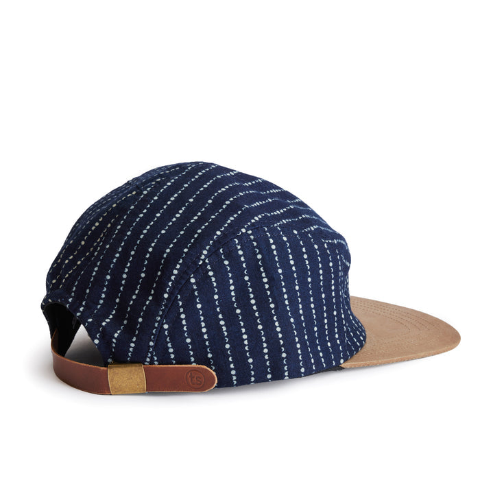 flatlay of the back of a TS x Hypeadelic cap