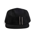 flatlay of the front of a TS x Hypeadelic cap