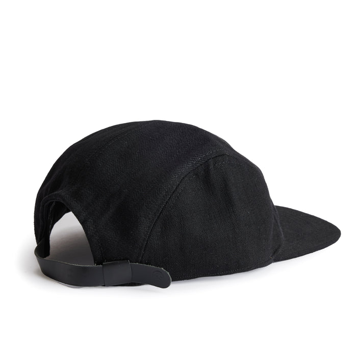 flatlay of the back of a TS x Hypeadelic cap
