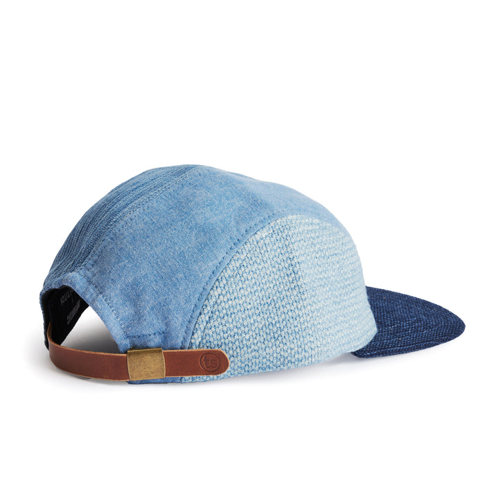 flatlay of the back of a TS x Hypeadelic cap