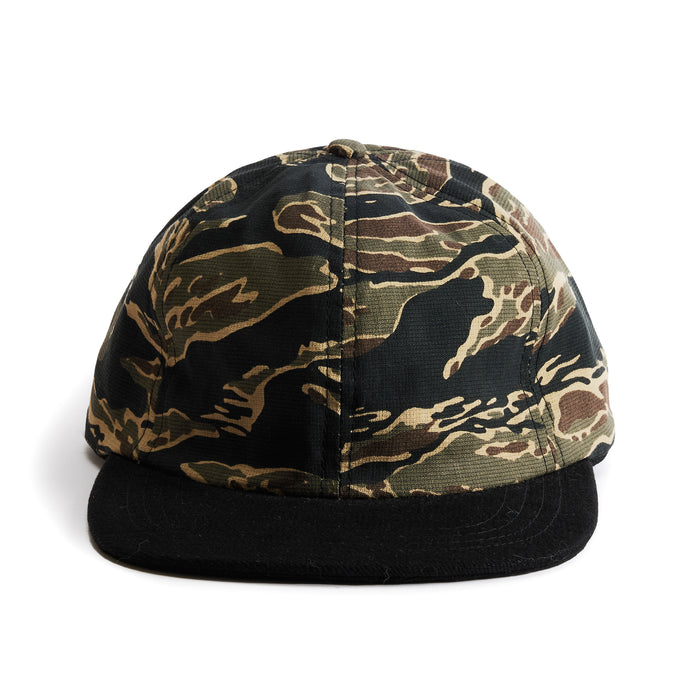 flatlay of the front of a TS x Hypeadelic cap