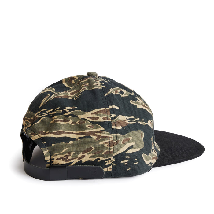 flatlay of the back of a TS x Hypeadelic cap