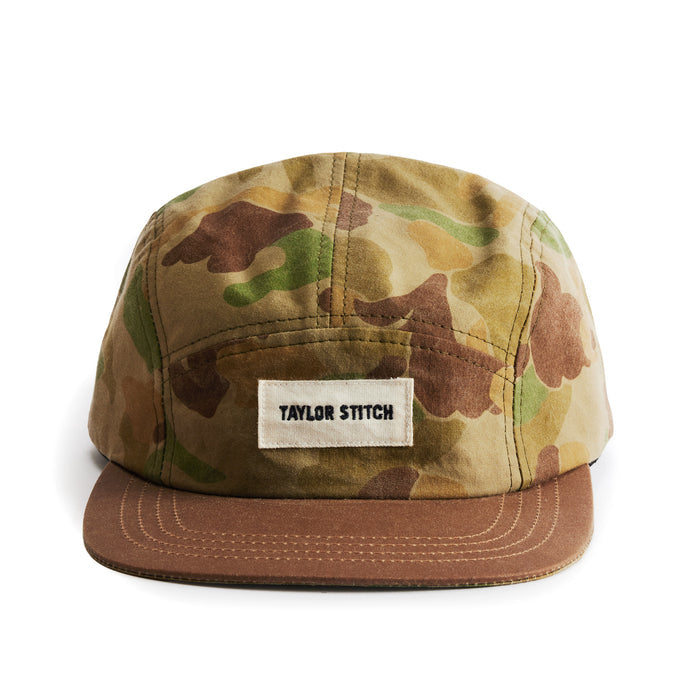 flatlay of the front of a TS x Hypeadelic cap