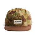 flatlay of the front of a TS x Hypeadelic cap