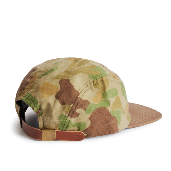 flatlay of the back of a TS x Hypeadelic cap