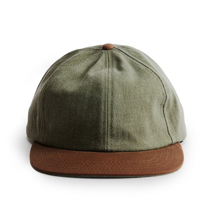 flatlay of the front of a TS x Hypeadelic cap