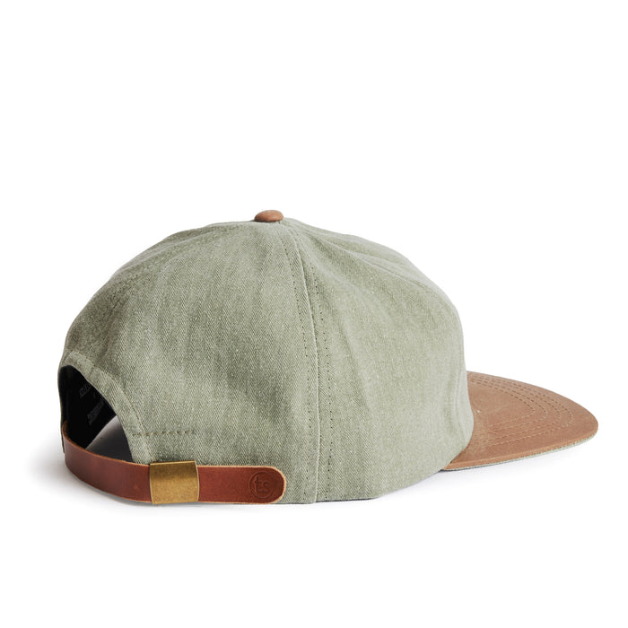 flatlay of the back of a TS x Hypeadelic cap