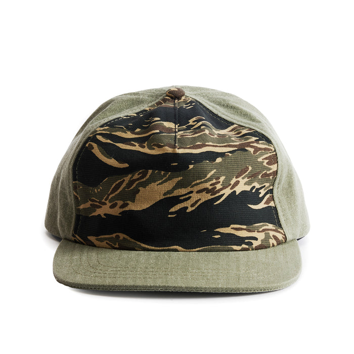 flatlay of the front of a TS x Hypeadelic cap
