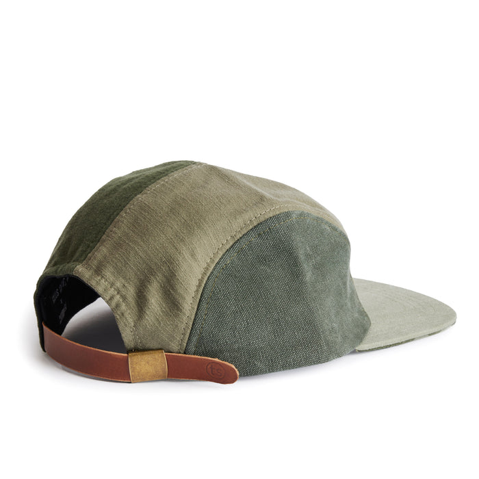 flatlay of the back of a TS x Hypeadelic cap