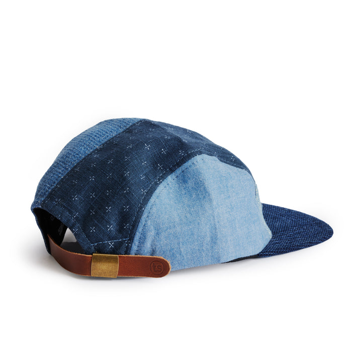flatlay of the back of a TS x Hypeadelic cap