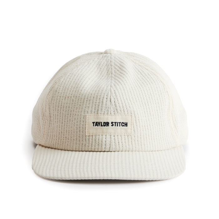 editorial image of front of The Taylor Stitch x Hypeadelic Cap v.35