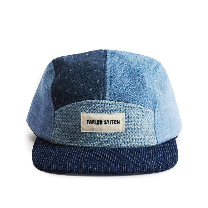 flatlay of the front of a TS x Hypeadelic cap