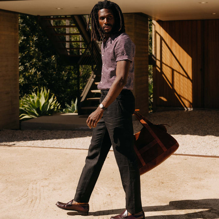 fit model walking in The Thomas Trouser in Coal Linen Twill