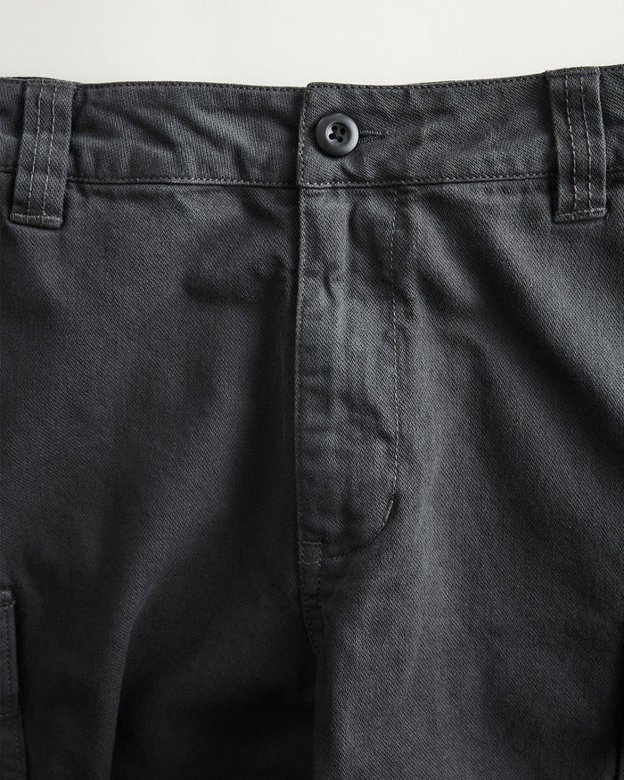 material shot of the button on The Tommie Short in Faded Black Broken Twill