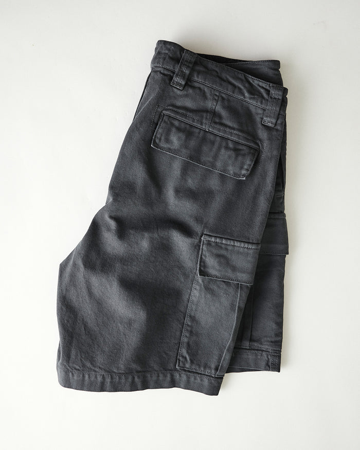 folded flatlay of The Tommie Short in Faded Black Broken Twill