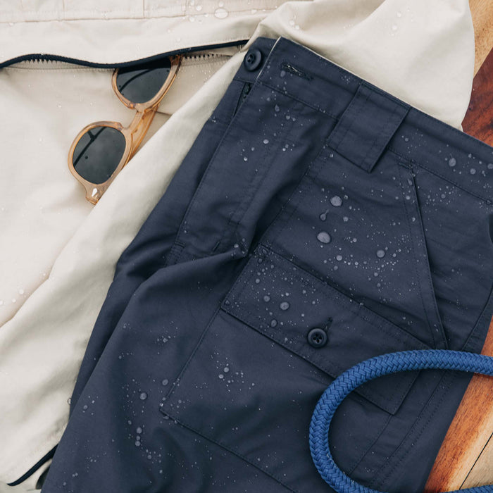 editorial image of The Trail Cargo Short in Faded Navy 60/40 Faille with water drops