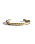 material shot of the front of The Twisted Cuff in Brass