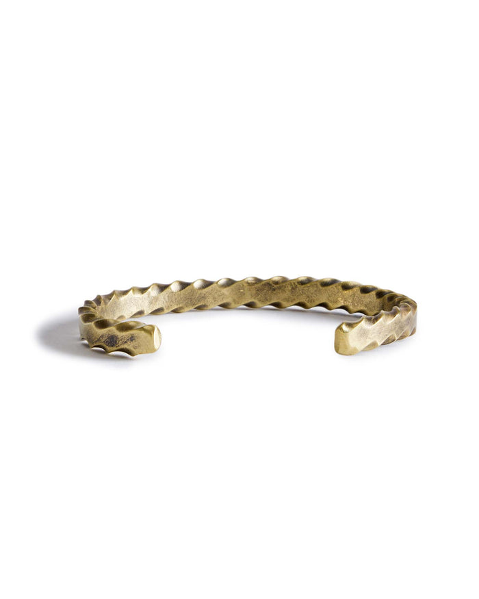 material shot of the back of The Twisted Cuff in Brass