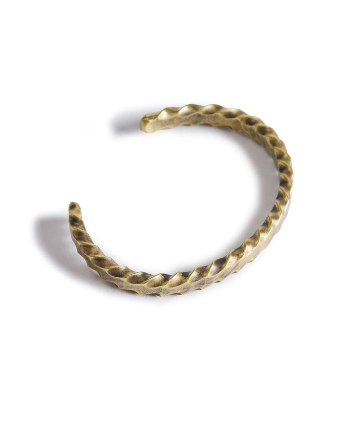 material shot of the top of The Twisted Cuff in Brass