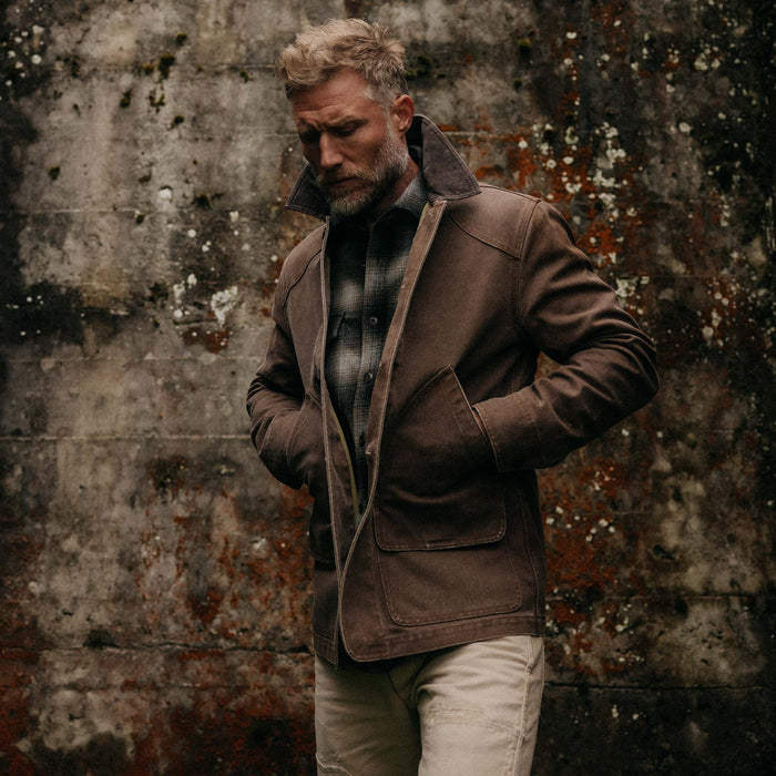 fit model with his hands in the pockets of The Upland Jacket in Aged Penny Chipped Canvas