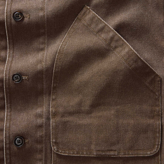 material shot of the pocket on The Upland Jacket in Aged Penny Chipped Canvas
