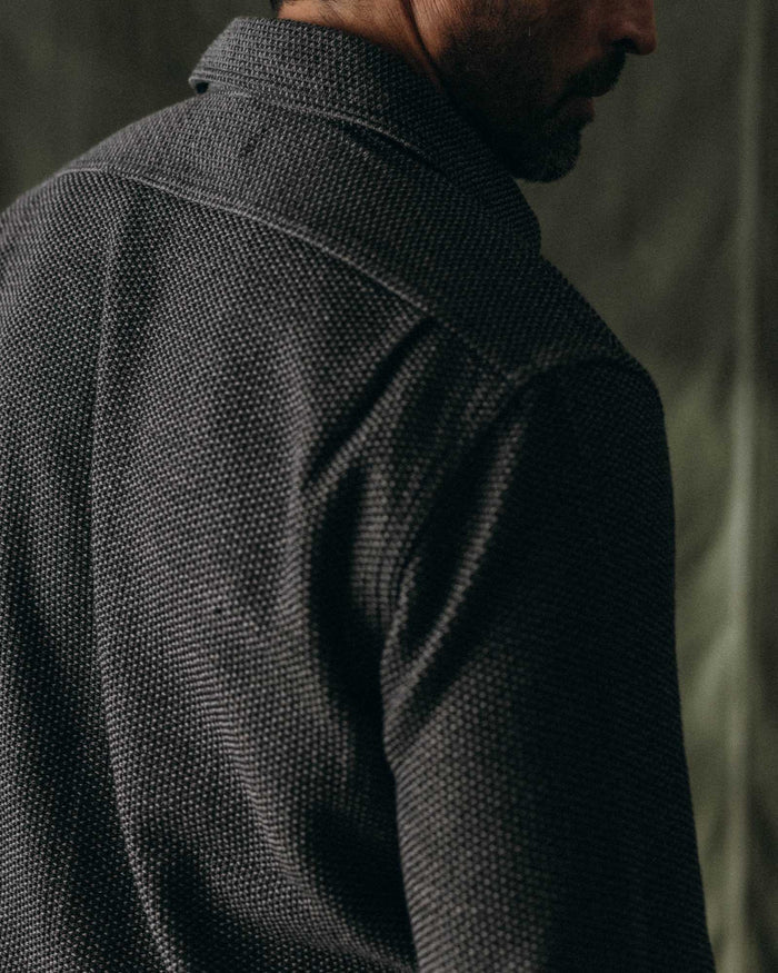 fit model showing off the back of The Utility Shirt in Charcoal Sashiko