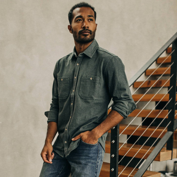 fit model wearing The Utility Shirt in Dark Slate Heavy Bag