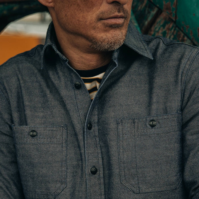 fit model rocking The Utility Shirt in Indigo Crosshatch, shot of chest pockets