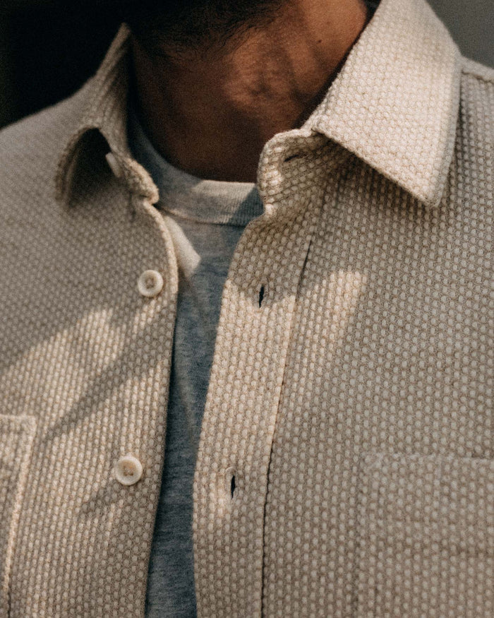 fit model drinking coffee wearing The Utility Shirt in Natural Sashiko