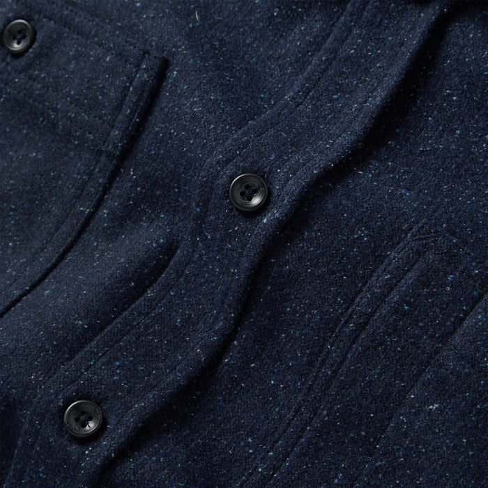 material shot of the buttons on The Utility Shirt in Navy Donegal Wool