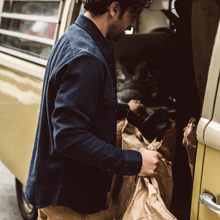 The fit model loading his van full of  plants