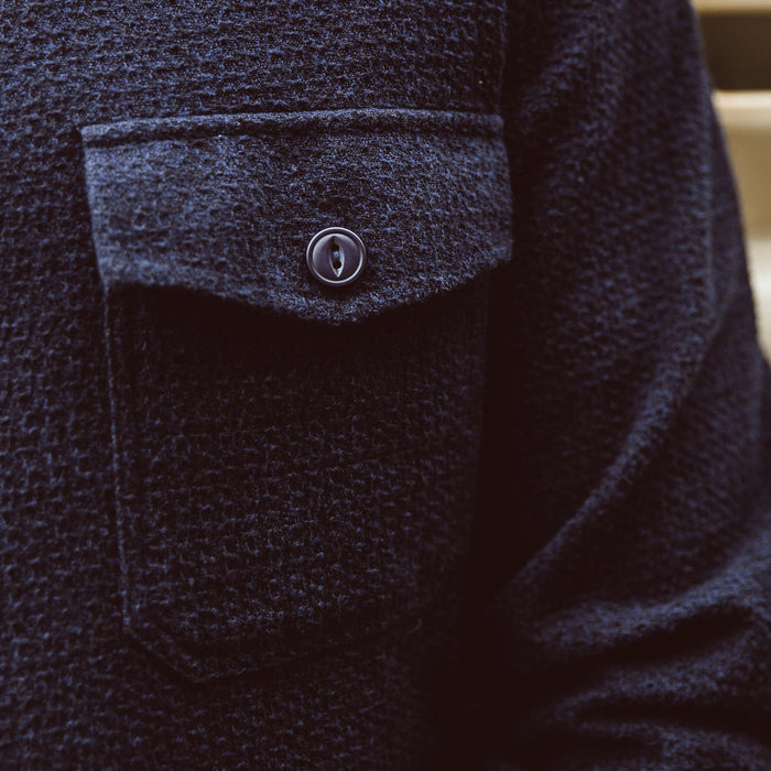 Up close of the utility shirt on the fit model