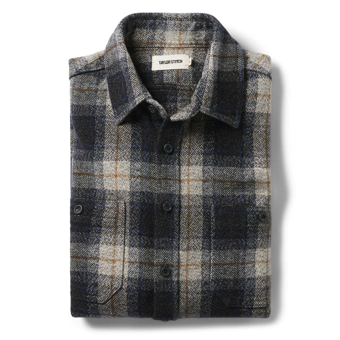 flatlay of The Utility Shirt in Navy Jaspe Herringbone Plaid folded