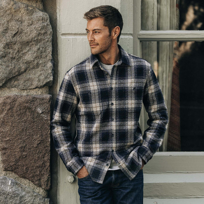 fit model posing in The Utility Shirt in Navy Jaspe Herringbone Plaid
