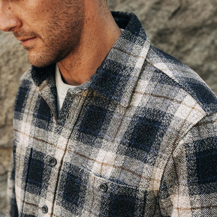 fit model showing off collar detail on The Utility Shirt in Navy Jaspe Herringbone Plaid