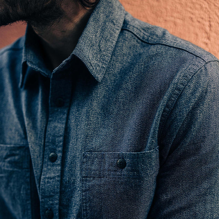 fit model showing off chest detail on The Utility Shirt in Navy Jaspe